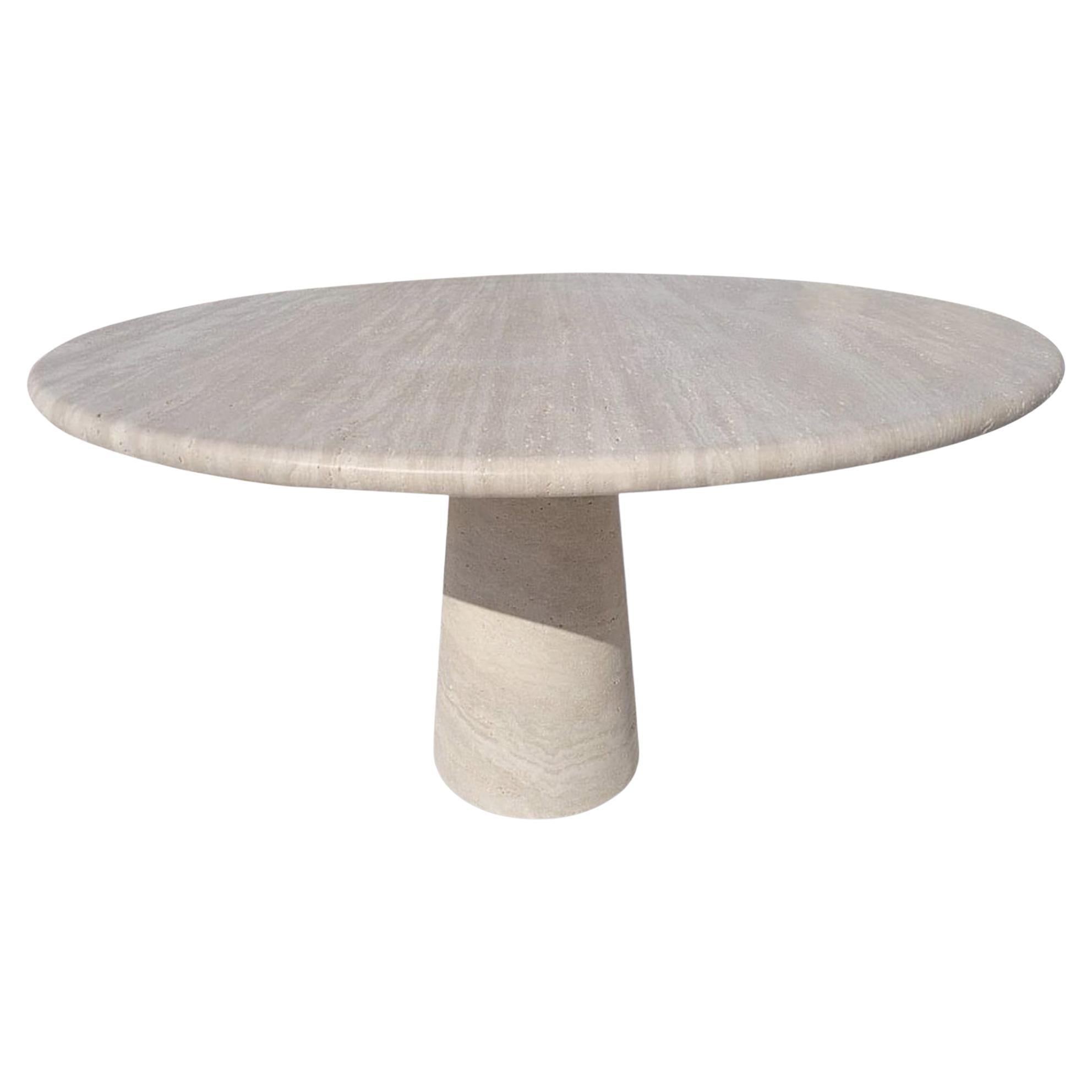 https://a.1stdibscdn.com/cream-travertine-round-dining-table-in-the-style-of-1970-angelo-mangiarotti-for-sale/f_80522/f_410004521723650395615/f_41000452_1723650396156_bg_processed.jpg