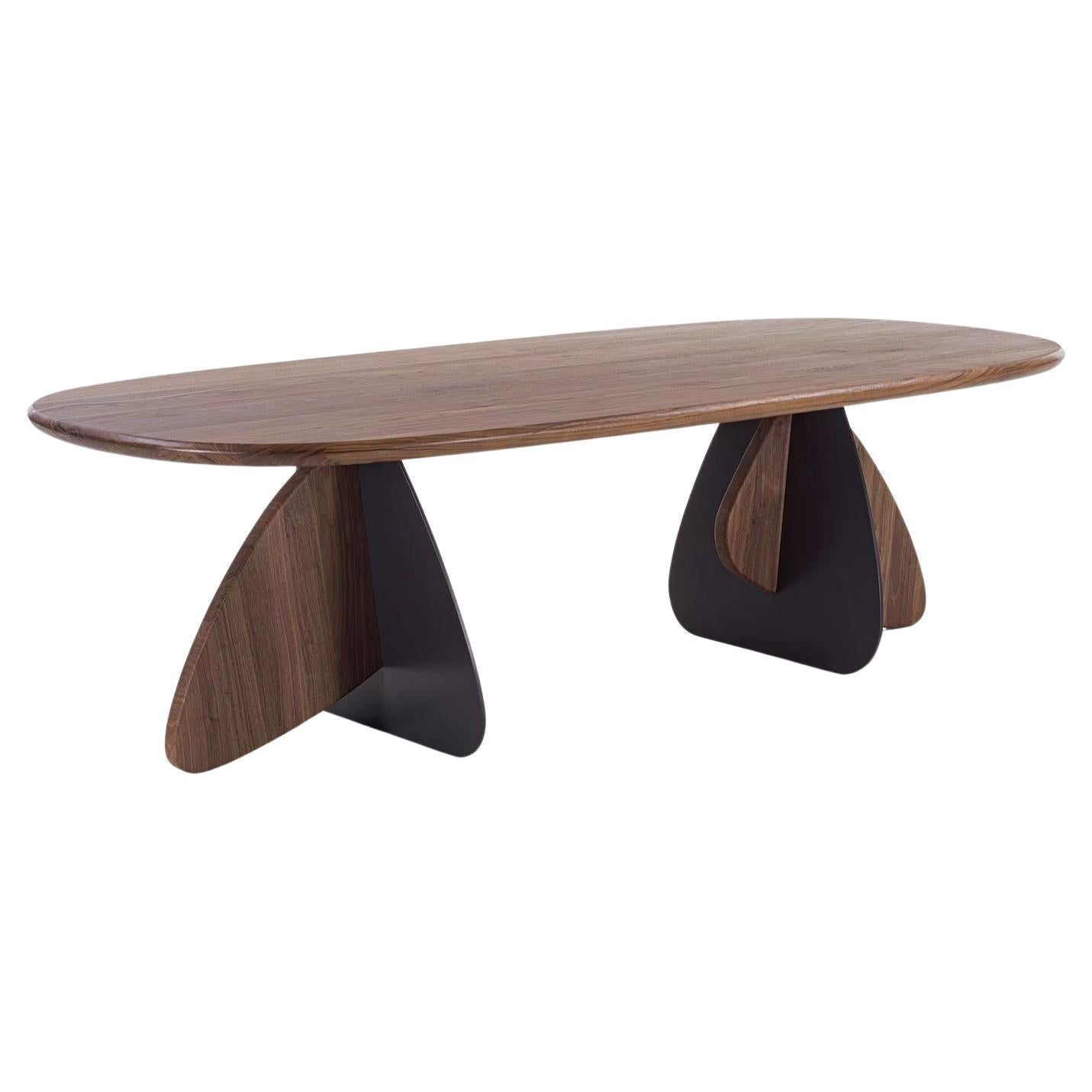 https://a.1stdibscdn.com/mediator-walnut-dining-table-for-sale/f_14282/f_410813321723733940805/f_41081332_1723733941125_bg_processed.jpg