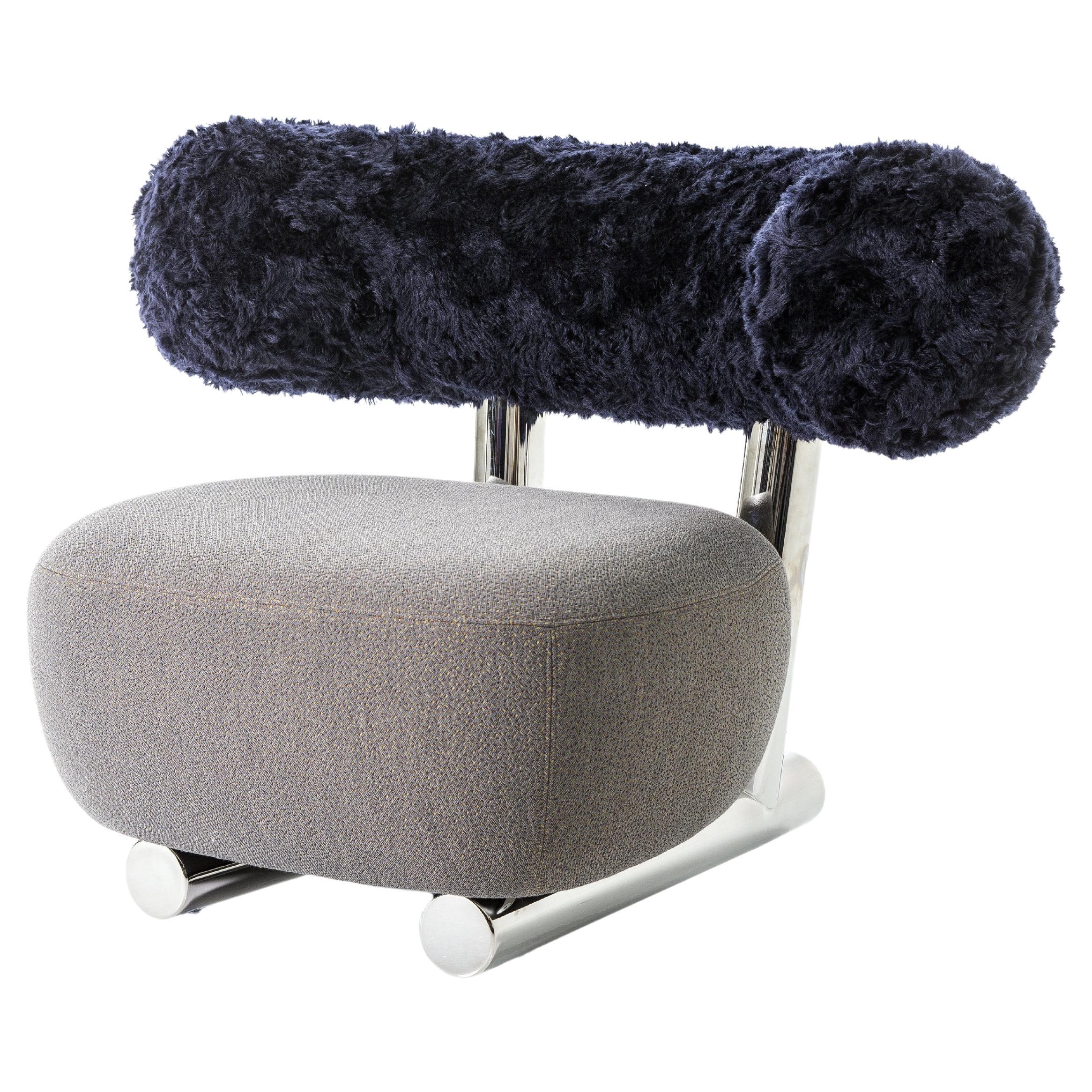 https://a.1stdibscdn.com/moroso-pipe-armchair-by-daniel-libeskind-for-sale/f_16392/f_411318521724150099135/f_41131852_1724150100313_bg_processed.jpg
