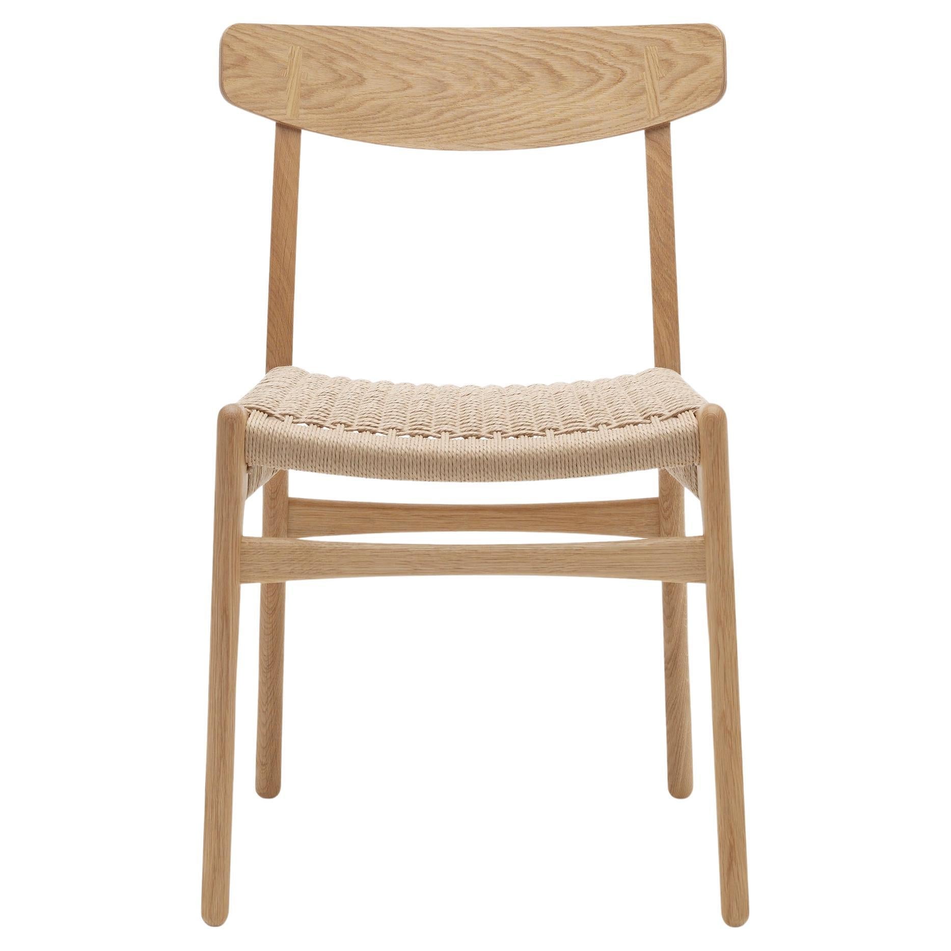 https://a.1stdibscdn.com/hans-wegner-ch23-chair-in-oak-oil-natural-papercord-for-carl-hansen-son-for-sale/f_14472/f_412964221725204253482/f_41296422_1725204253948_bg_processed.jpg