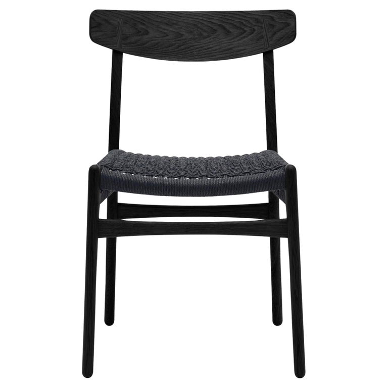 https://a.1stdibscdn.com/hans-wegner-ch23-chair-in-black-oak-black-papercord-for-carl-hansen-son-for-sale/f_14472/f_412966721725206555237/f_41296672_1725206555688_bg_processed.jpg?width=768