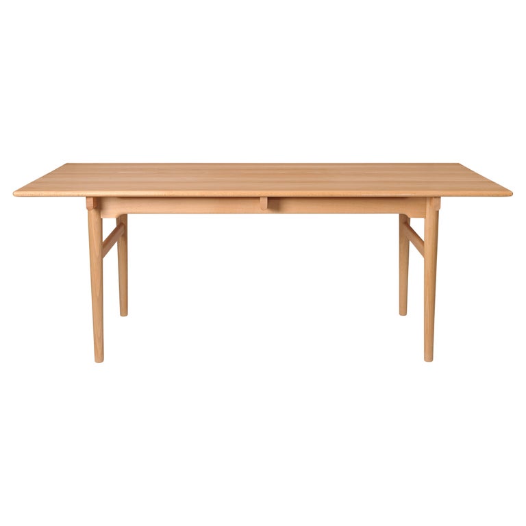 https://a.1stdibscdn.com/large-hans-wegner-ch327-dining-table-in-oiled-beech-for-carl-hansen-son-for-sale/f_14472/f_413382621725523262000/f_41338262_1725523263656_bg_processed.jpg?width=768