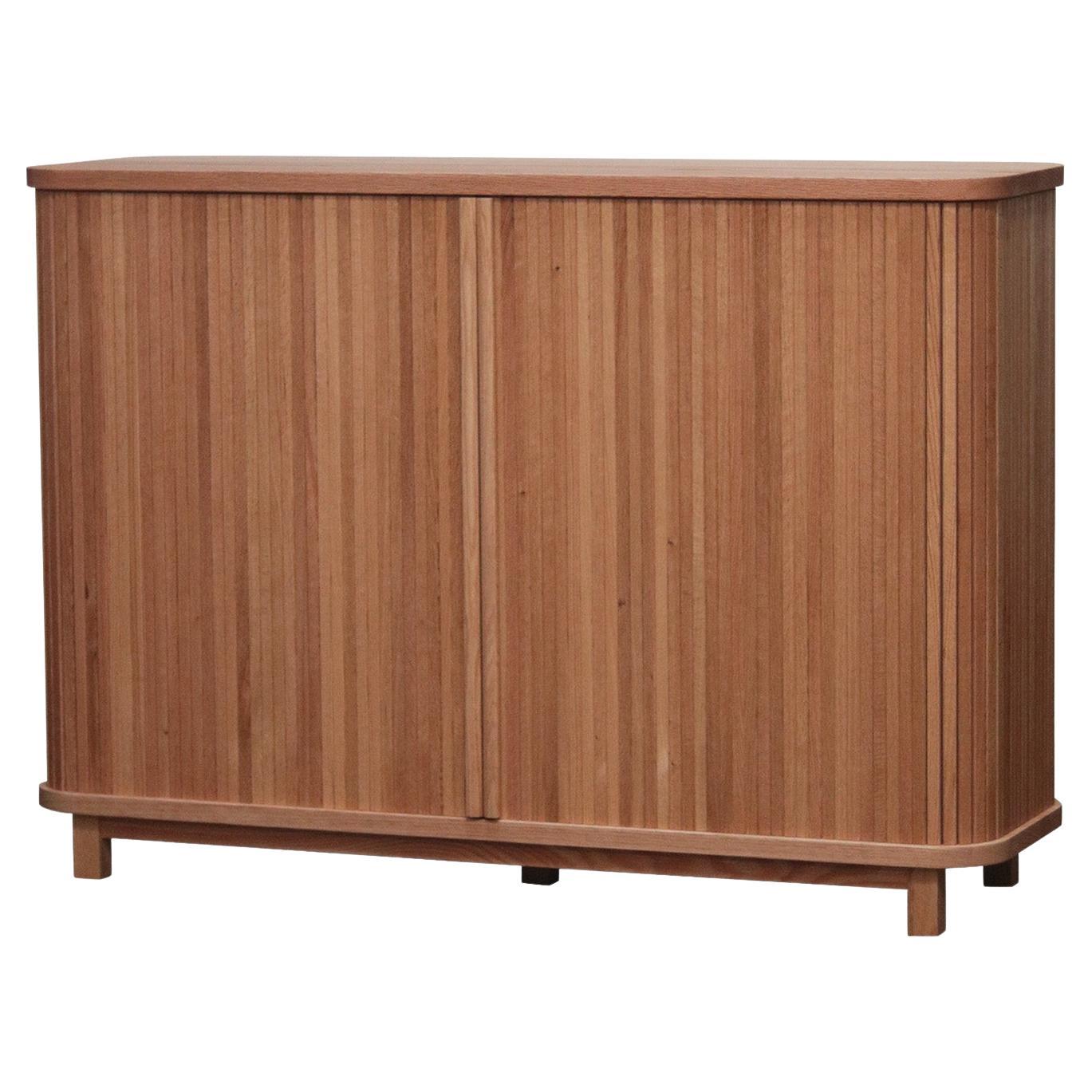 https://a.1stdibscdn.com/mistry-tambour-door-cabinet-in-natural-oak-for-sale/f_48391/f_413522221725580378776/f_41352222_1725580379269_bg_processed.jpg