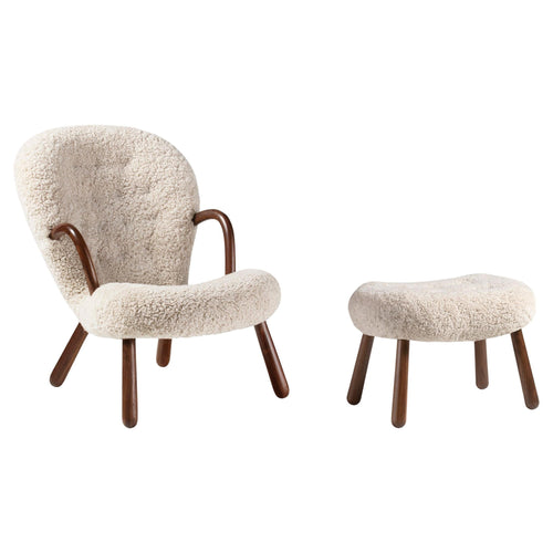 https://a.1stdibscdn.com/arnold-madsen-sheepskin-clam-chair-stool-for-sale/f_13332/f_413826121725795724861/f_41382612_1725795725458_bg_processed.jpg