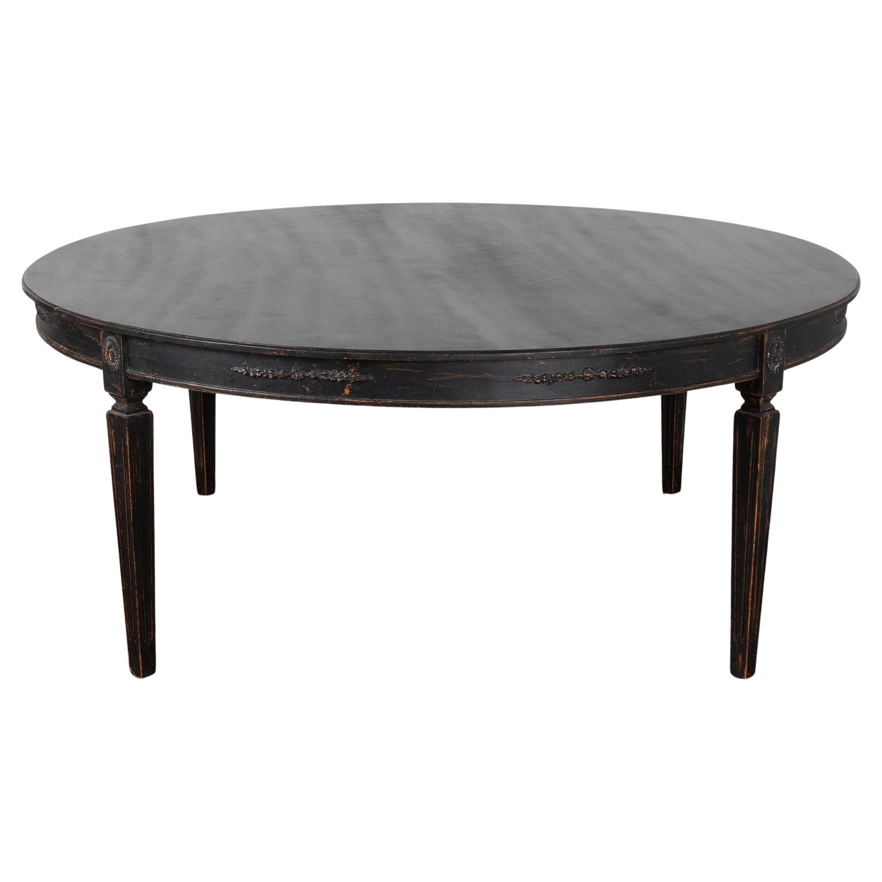 https://a.1stdibscdn.com/large-round-swedish-black-dining-table-reproduction-for-sale/f_9236/f_417529221727983339672/f_41752922_1727983340240_bg_processed.jpg