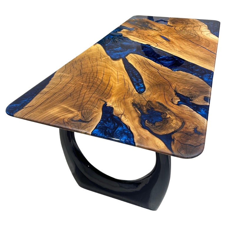 https://a.1stdibscdn.com/walnut-resin-river-dining-table-epoxy-wood-table-epoxy-resin-table-top-for-sale/f_91932/f_419892621729604661433/f_41989262_1729604662655_bg_processed.jpg?width=768