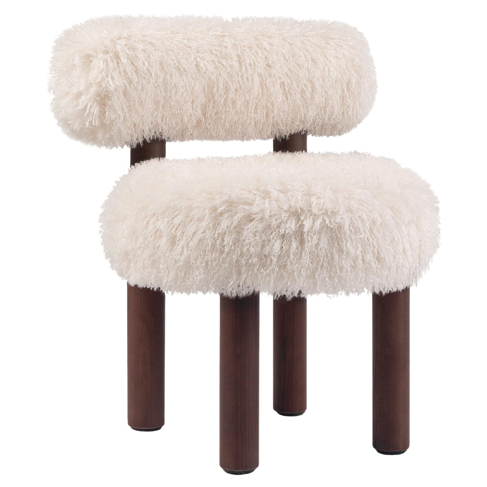 https://a.1stdibscdn.com/modern-dining-chair-gropius-cs2-fluffy-with-wooden-legs-in-azur-faux-fur-by-noom-for-sale/f_42321/f_422502421731236621325/f_42250242_1731236621977_bg_processed.jpg