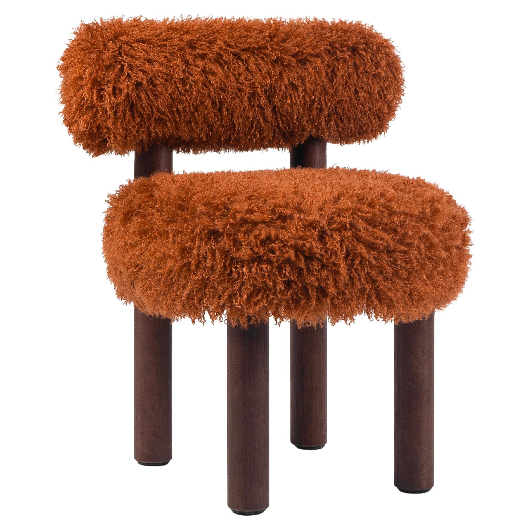 https://a.1stdibscdn.com/modern-dining-chair-gropius-cs2-fluffy-with-wooden-legs-in-azur-faux-fur-by-noom-for-sale/f_42321/f_423059321731576193841/f_42305932_1731576194653_bg_processed.jpg