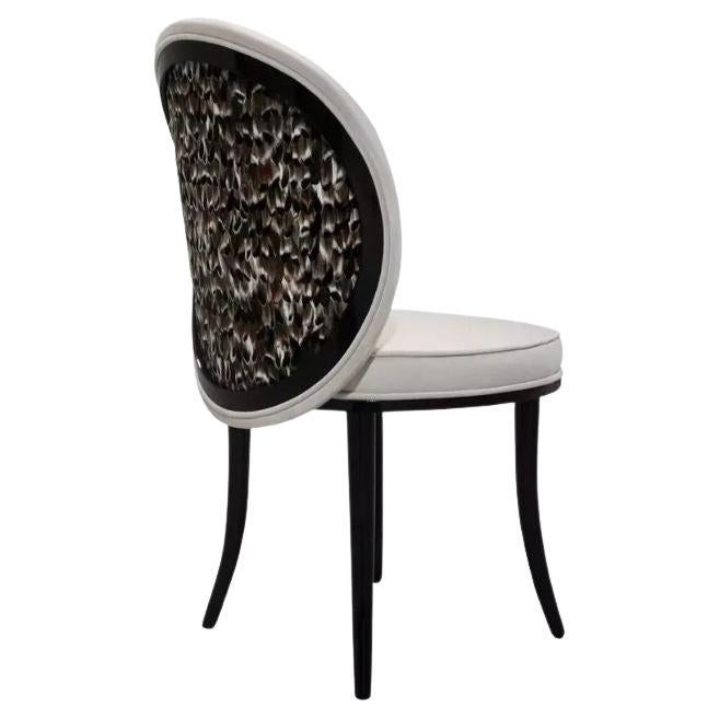 https://a.1stdibscdn.com/merveille-folie-feather-back-dining-chair-for-sale/f_74772/f_424907821732703005932/f_42490782_1732703006154_bg_processed.jpg