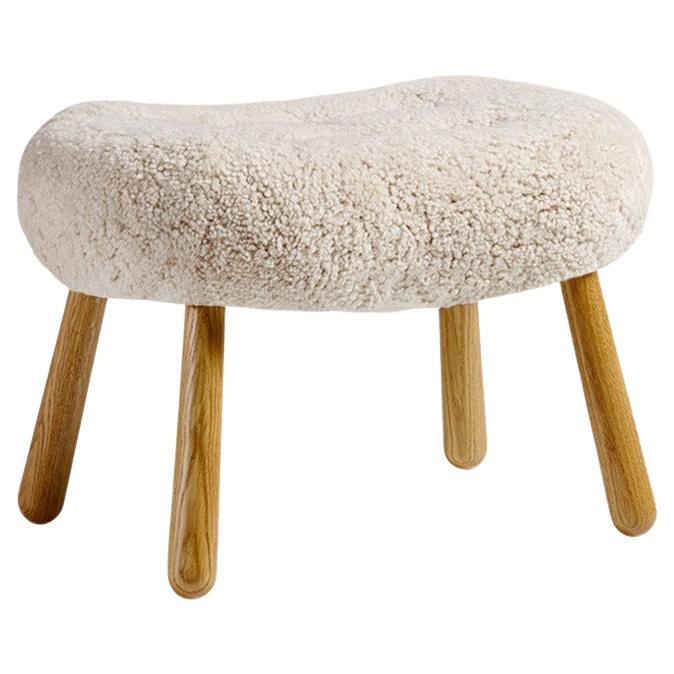 https://a.1stdibscdn.com/arnold-madsen-sheepskin-clam-stool-for-sale/f_13332/f_427735021734355182121/f_42773502_1734355182256_bg_processed.jpg
