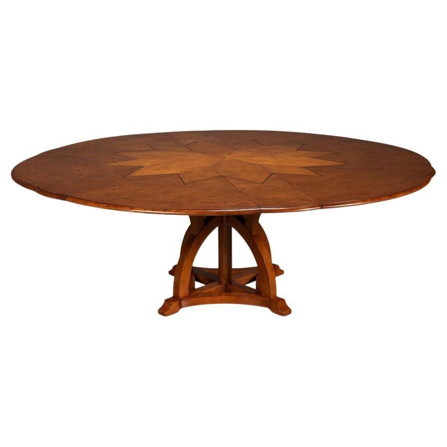 https://a.1stdibscdn.com/round-walnut-dining-table-70-for-sale/f_8038/f_427751721734360693992/f_42775172_1734360694170_bg_processed.jpg