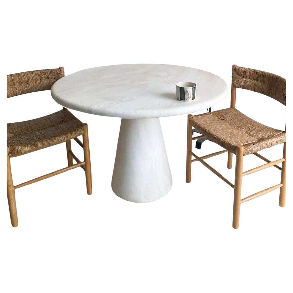 https://a.1stdibscdn.com/minimalist-travertine-round-center-table-marble-living-room-coctail-table-for-sale/f_91932/f_430929021736497545045/f_43092902_1736497545337_bg_processed.jpg
