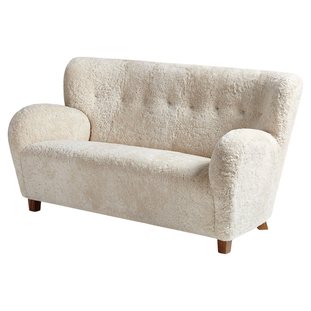 https://a.1stdibscdn.com/custom-made-sheepskin-karu-sofa-by-dagmar-for-sale/f_13332/f_431187721736615638786/f_43118772_1736615639496_bg_processed.jpg