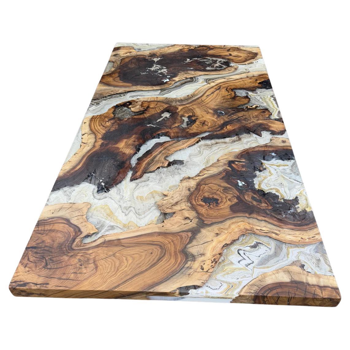 https://a.1stdibscdn.com/extraordinary-white-onix-marble-design-epoxy-resin-dining-table-by-tinella-for-sale/f_91932/f_431894121737105375840/f_43189412_1737105376224_bg_processed.jpg