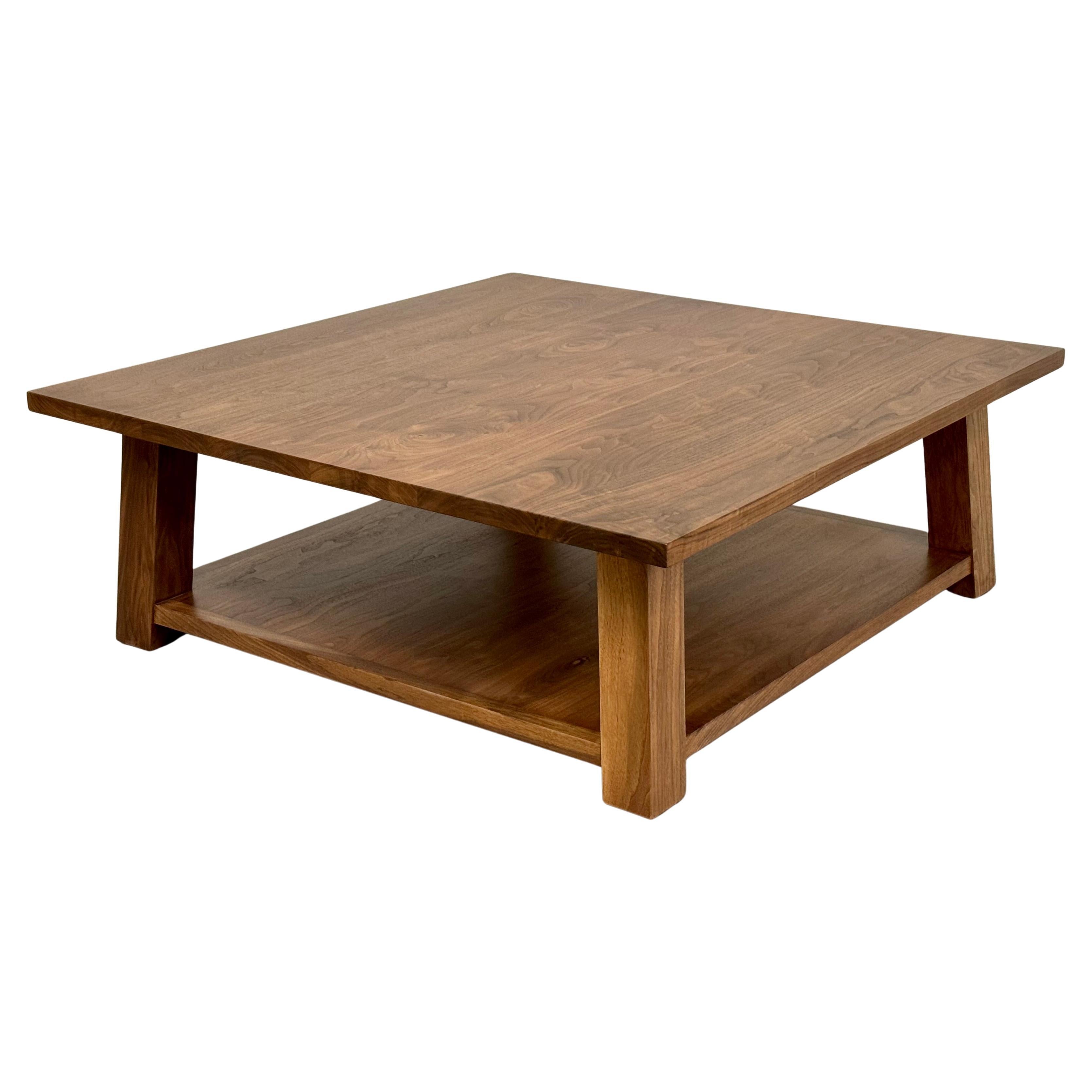 https://a.1stdibscdn.com/custom-klara-coffee-table-in-walnut-by-petersen-antiques-for-sale/f_8065/f_432685821737485264257/f_43268582_1737485265498_bg_processed.jpg