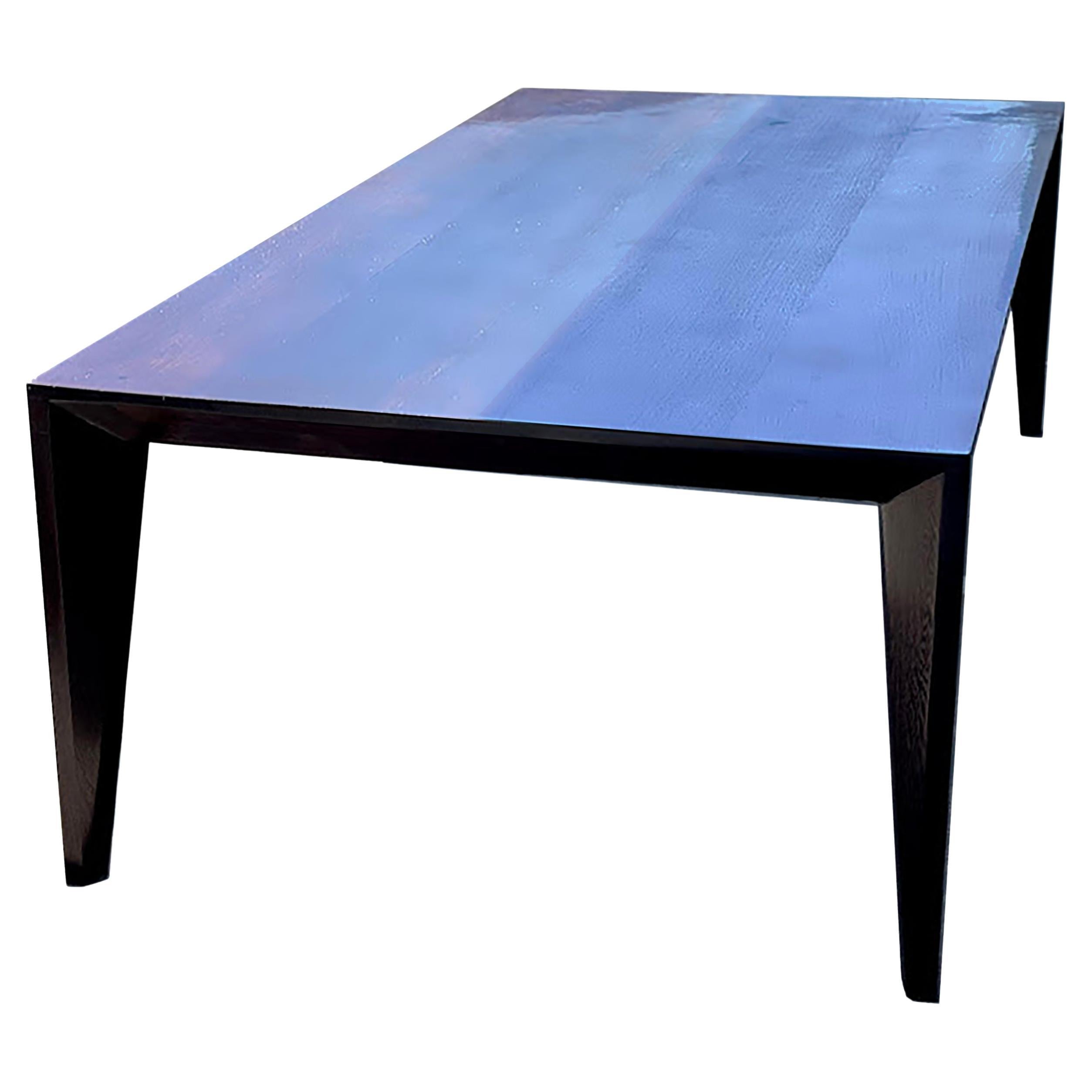https://a.1stdibscdn.com/modern-minimalist-black-dining-table-with-sleek-design-for-sale/f_102222/f_432871421737585049680/f_43287142_1737585050460_bg_processed.jpg