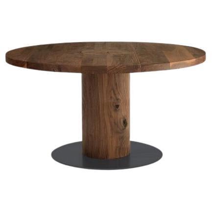 https://a.1stdibscdn.com/solid-wood-round-dining-table-with-metal-base-for-sale/f_27693/f_434715121738669394924/f_43471512_1738669395022_bg_processed.jpg
