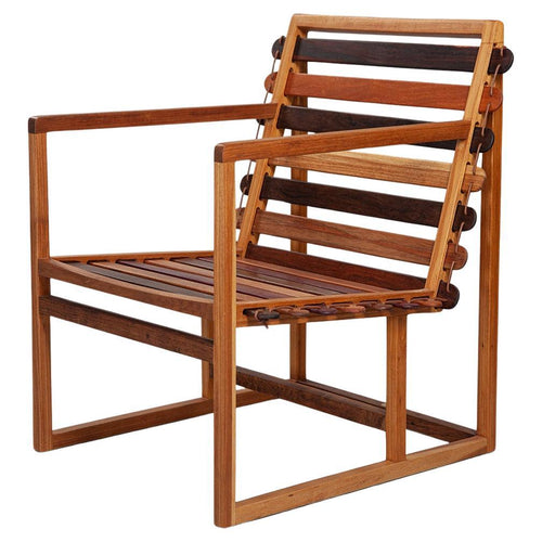 https://a.1stdibscdn.com/vino-armchair-made-from-various-brazilian-woods-showroom-sample-for-sale/f_88362/f_488214521771182800099/f_43523652_1738931697675_bg_processed.jpg