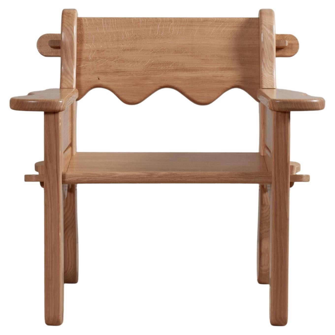 https://a.1stdibscdn.com/handcrafted-oak-lounge-chair-for-sale/f_12322/f_435728721739208892534/f_43572872_1739208892907_bg_processed.jpg