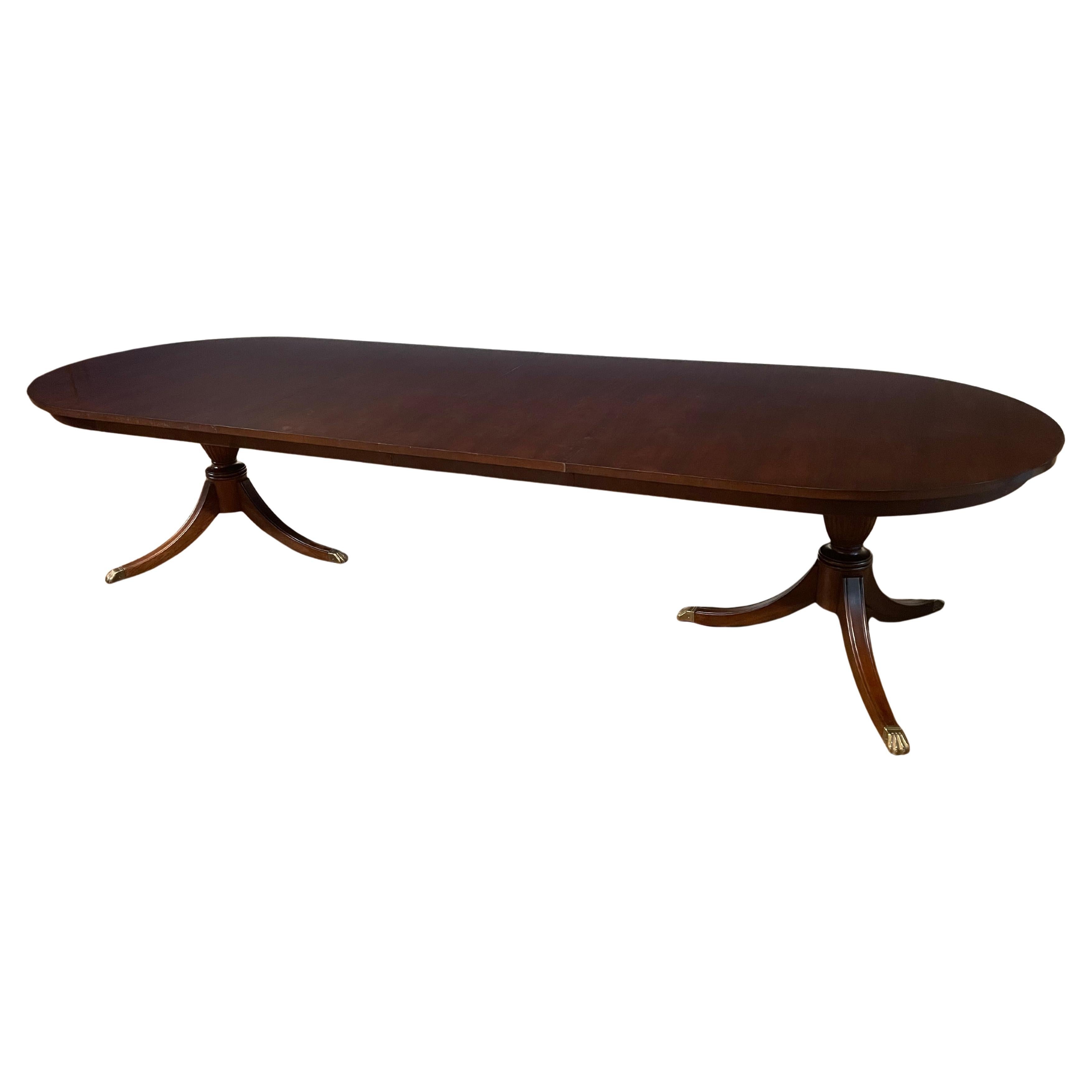 https://a.1stdibscdn.com/oval-mahogany-double-pedestal-dining-table-by-leighton-hall-made-to-order-for-sale/f_44162/f_435790121739241557805/f_43579012_1739241558811_bg_processed.jpg