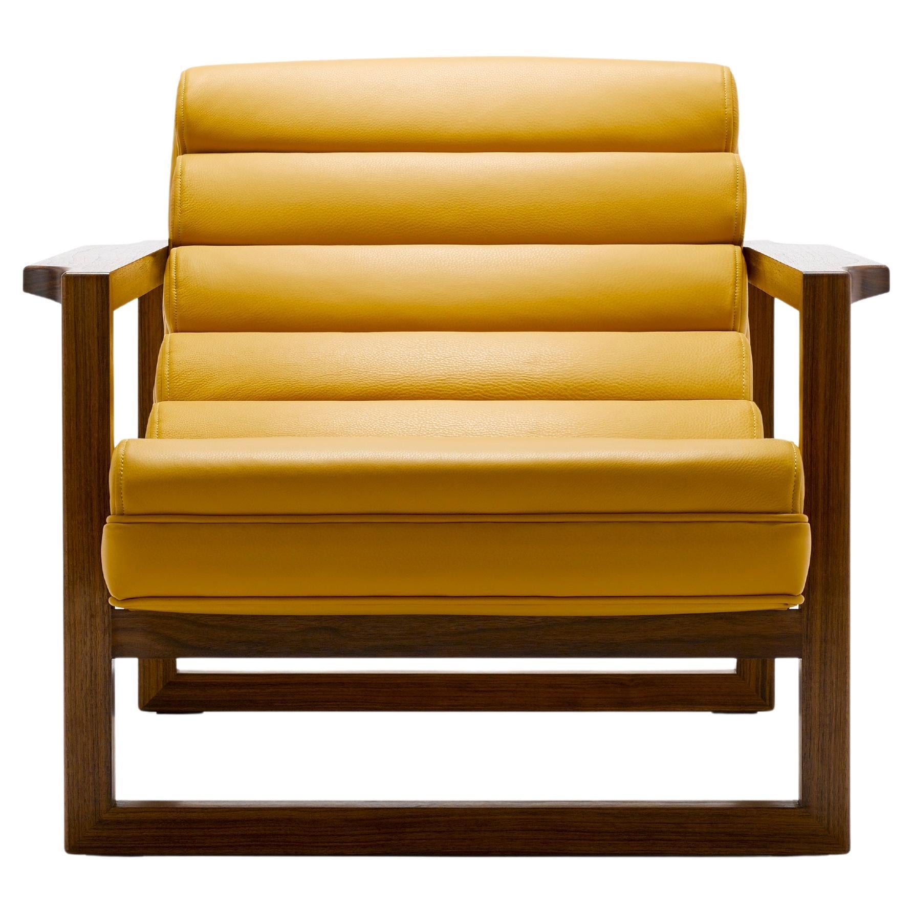https://a.1stdibscdn.com/contemporary-channeled-florence-easy-chair-in-yellow-leather-and-walnut-frame-for-sale/f_27813/f_435994421764581639647/f_43599442_1764581640221_bg_processed.jpg