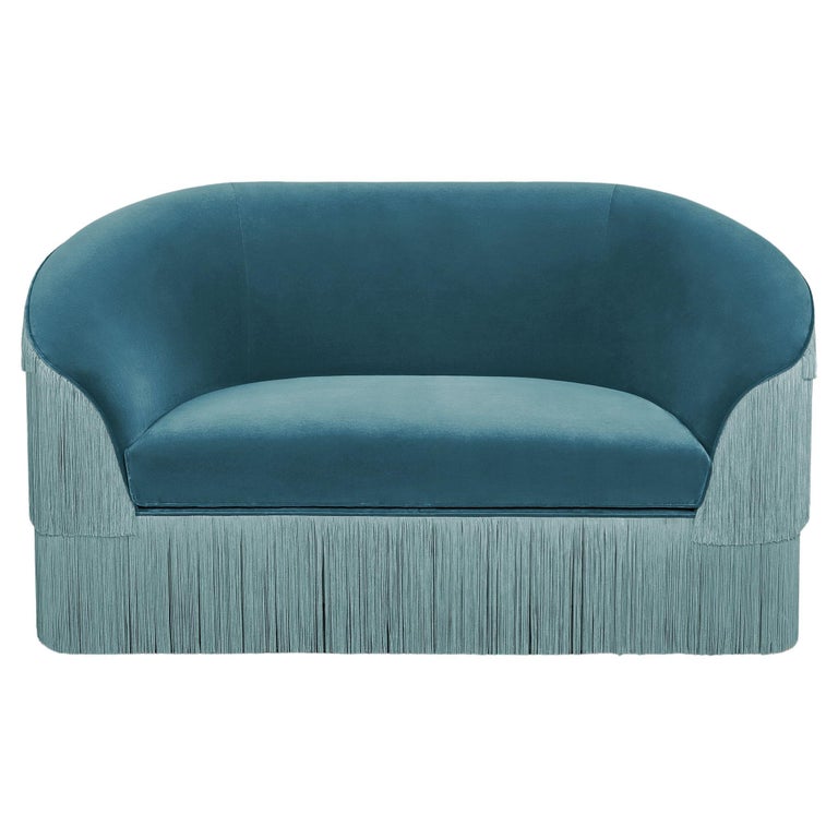 https://a.1stdibscdn.com/fringes-2-seat-sofa-by-munna-for-sale/f_12192/f_436304321739546900857/f_43630432_1739546901386_bg_processed.jpg?width=768