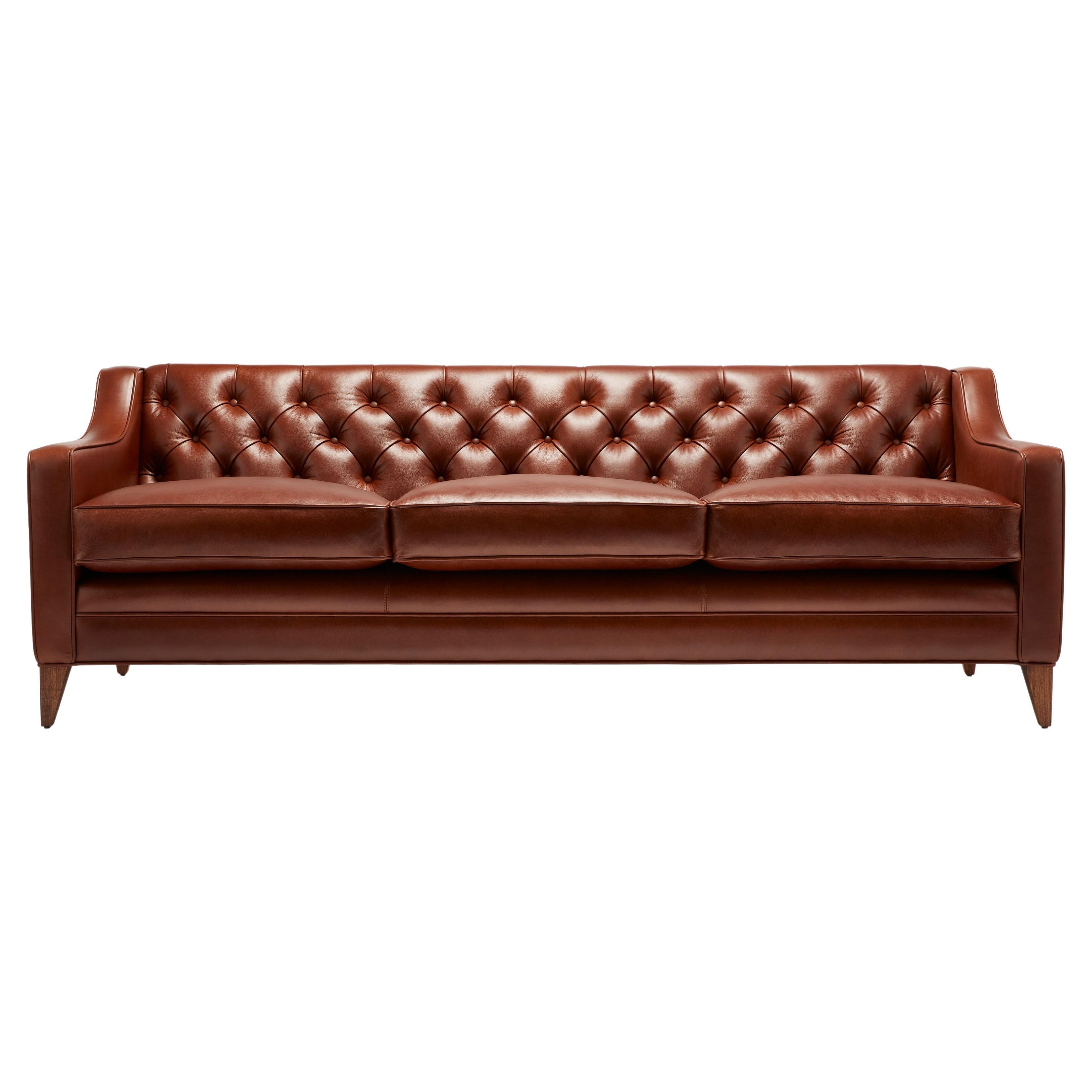 https://a.1stdibscdn.com/contemporary-leather-formalis-deep-buttoned-back-sofa-in-with-oak-or-walnut-legs-for-sale/f_27813/f_436643821739800845953/f_43664382_1739800846958_bg_processed.jpg