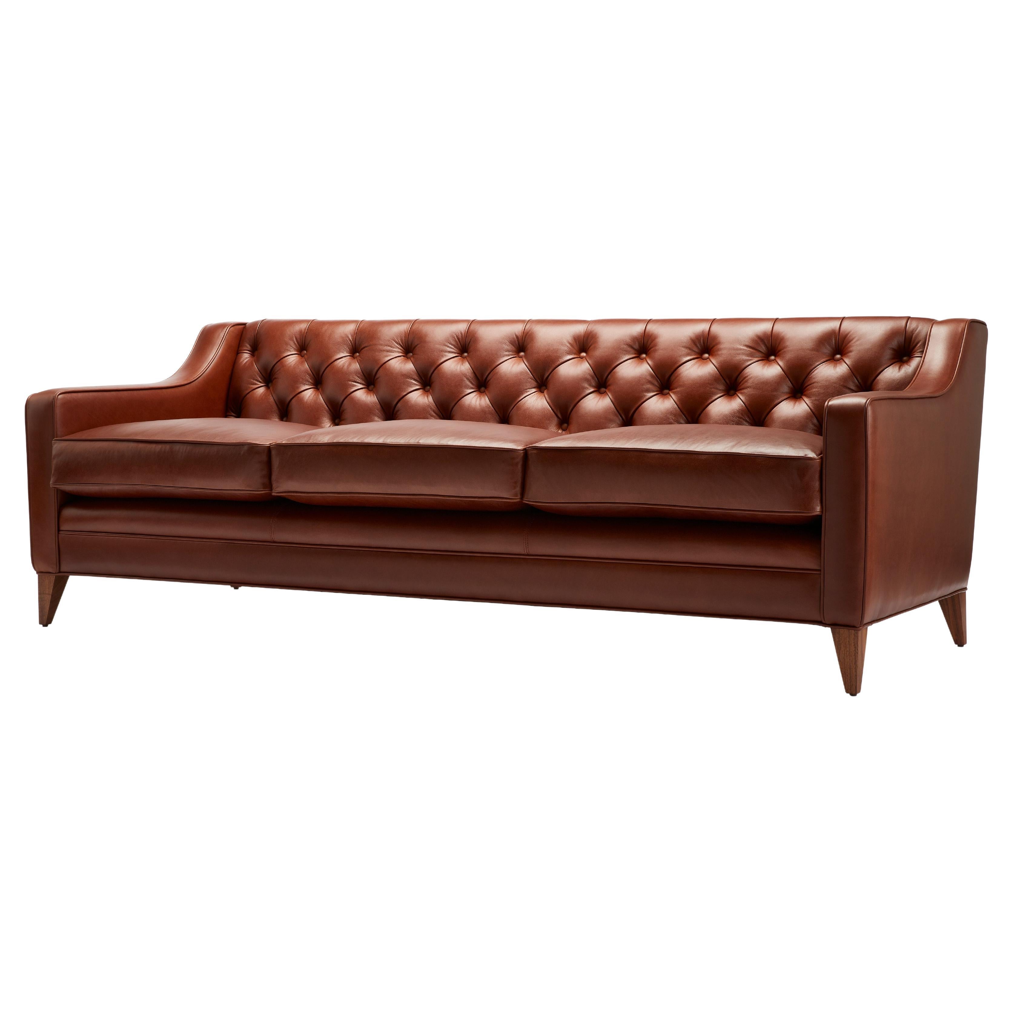 https://a.1stdibscdn.com/contemporary-leather-formalis-deep-buttoned-back-sofa-in-with-oak-or-walnut-legs-for-sale-picture-2/f_27813/f_436643821739800917139/f_43664382_1739800918191_bg_processed.jpg