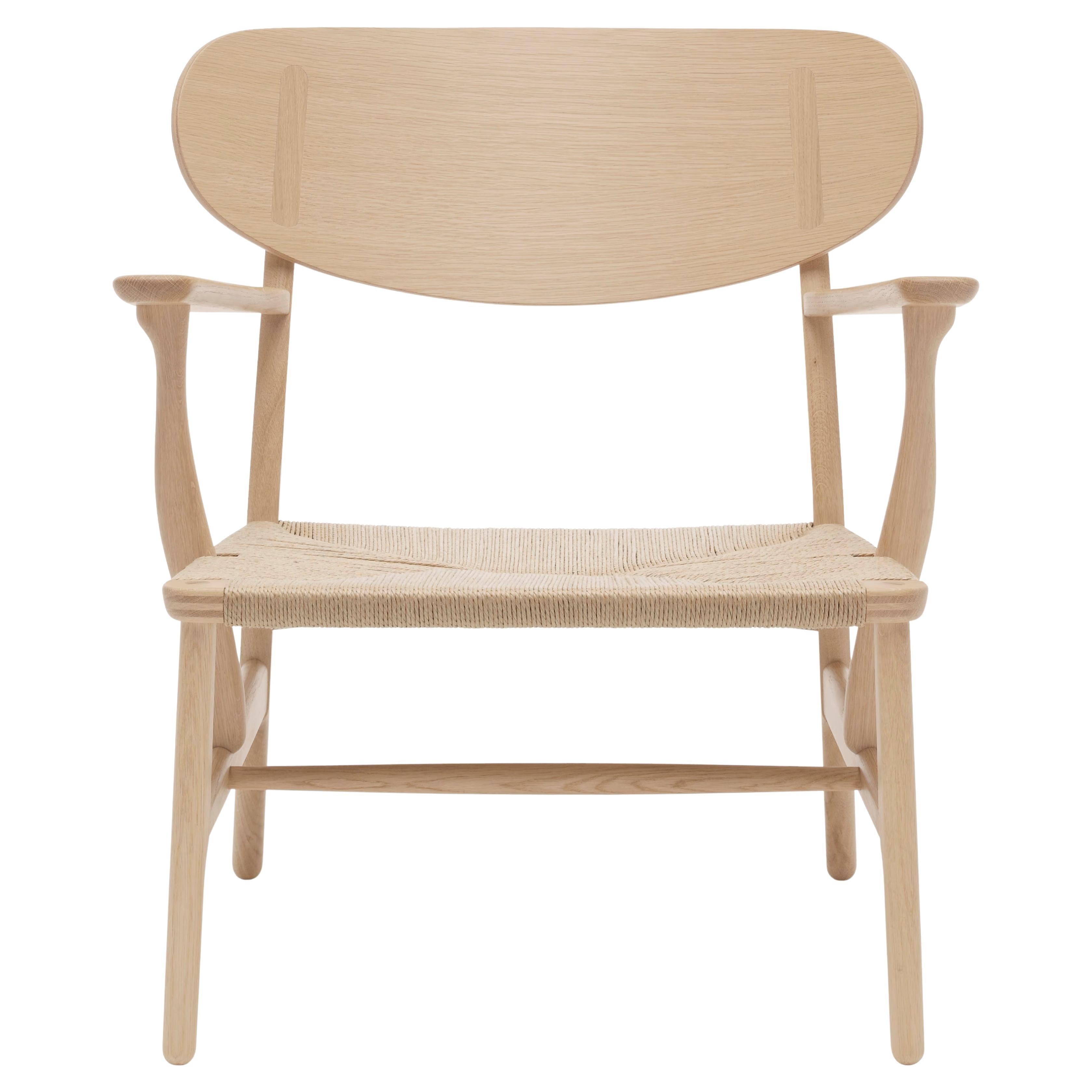 https://a.1stdibscdn.com/wegner-ch22-chair-in-oak-white-oil-natural-papercord-for-carl-hansen-son-for-sale/f_14472/f_438176321740617631166/f_43817632_1740617632445_bg_processed.jpg