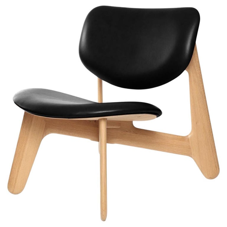 https://a.1stdibscdn.com/tom-dixon-black-stained-oak-and-black-leather-slab-lounge-chair-for-sale-picture-8/f_14472/f_438994721741119546693/f_43897342_1741113609210_bg_processed.jpg?width=768