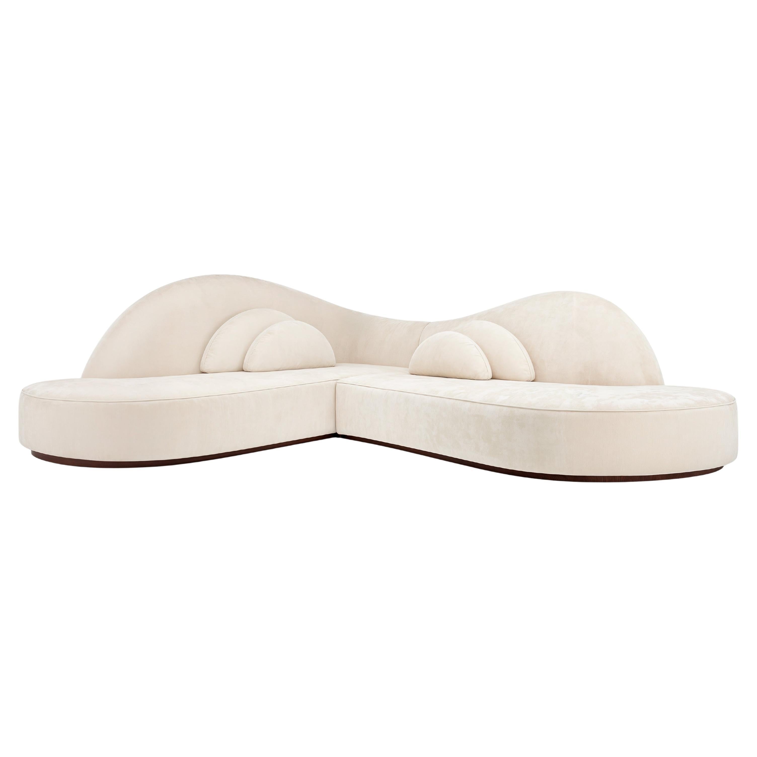 https://a.1stdibscdn.com/illusion-curved-corner-sofa-in-high-performing-ecru-velvet-by-sidani-design-for-sale/f_27693/f_476217121763582298066/f_44088622_1742242615482_bg_processed.jpg