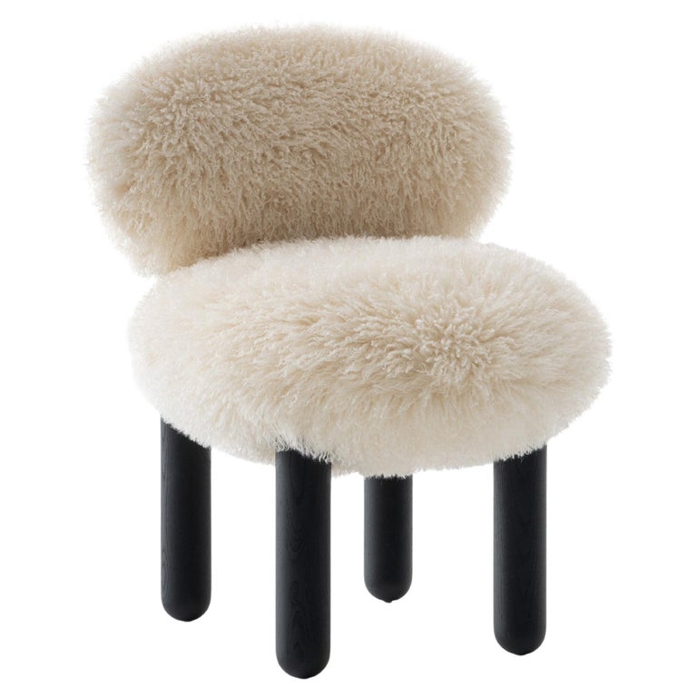 https://a.1stdibscdn.com/modern-dining-chair-flock-cs2-fluffy-edition-in-premium-faux-fur-by-noom-for-sale/f_42321/f_441094321742374526463/f_44109432_1742374527112_bg_processed.jpg?width=768