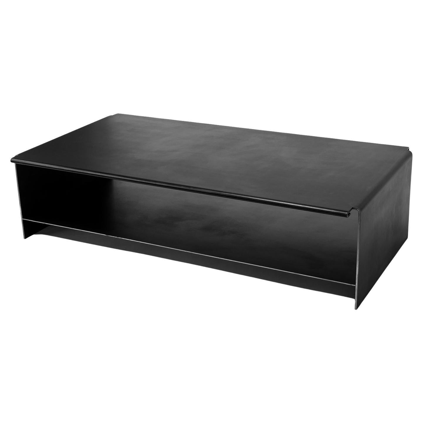 https://a.1stdibscdn.com/olsen-kundig-coffee-table-contemporary-modern-handmade-blackened-steel-large-for-sale/f_30173/f_442468121743096384235/f_44246812_1743096384670_bg_processed.jpg