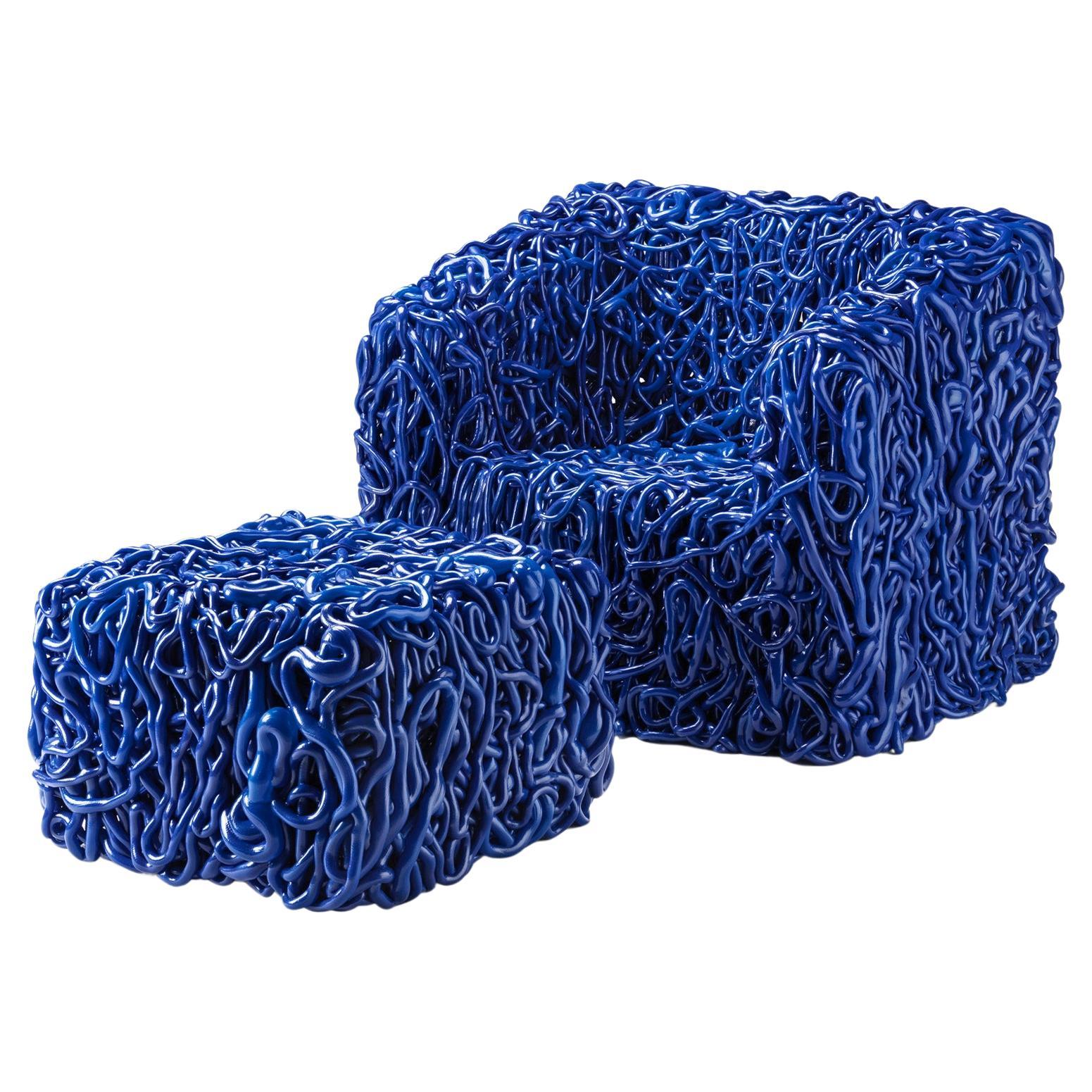 https://a.1stdibscdn.com/senzafine-armchair-pouf-in-polyurethane-blue-by-gaetano-pesce-for-sale/56838172/f_445316421744725131594/f_44531642_1744725132057_bg_processed.jpg