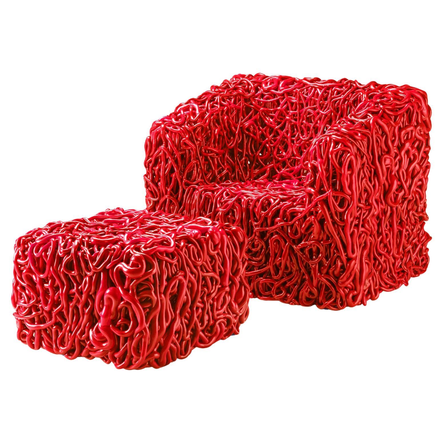 https://a.1stdibscdn.com/senzafine-armchair-pouf-in-polyurethane-red-by-gaetano-pesce-for-sale/56838172/f_445316921744725207444/f_44531692_1744725207901_bg_processed.jpg