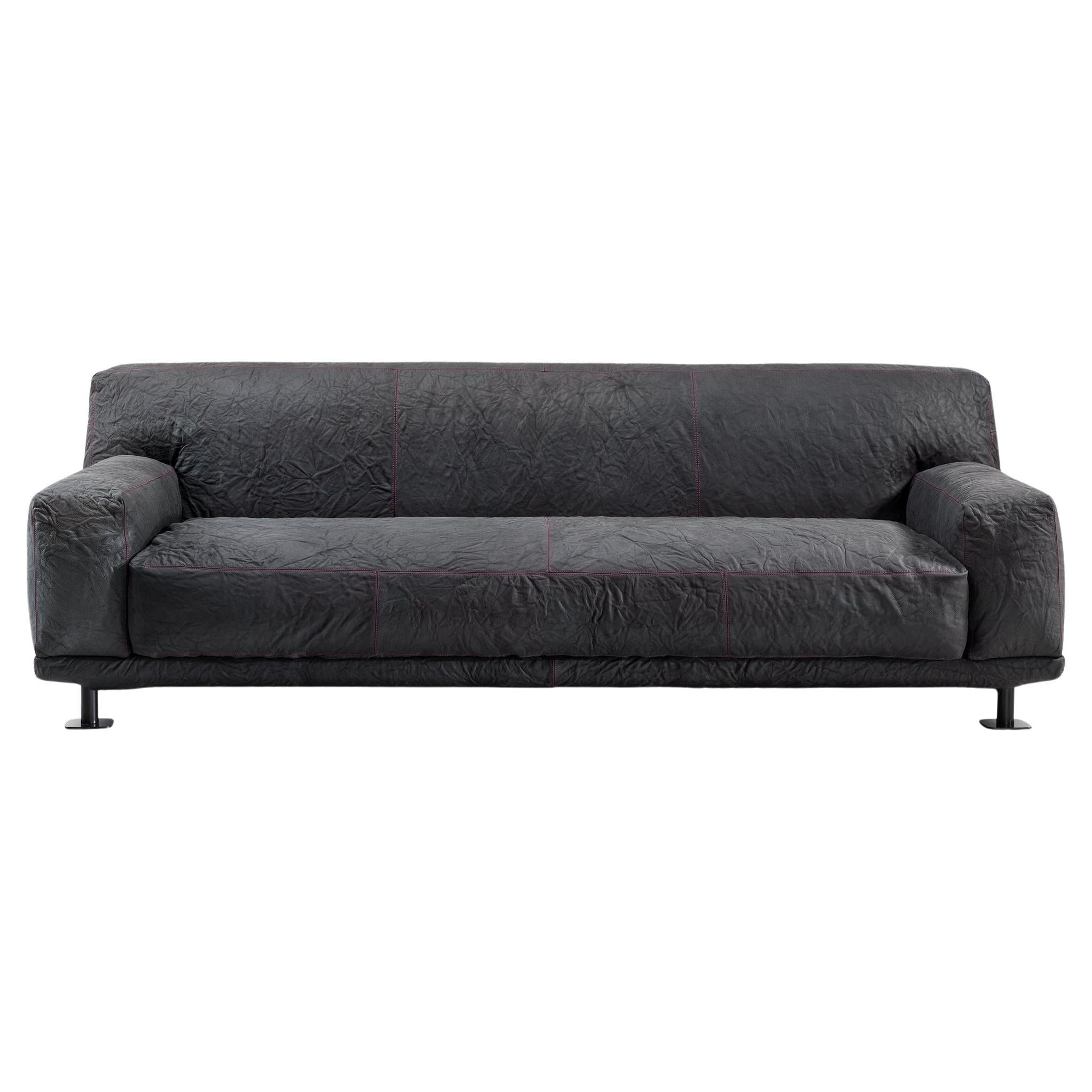 https://a.1stdibscdn.com/newcastle-232-leather-sofa-slate-magenta-by-giulio-iacchetti-for-sale/56838172/f_445317821744725473073/f_44531782_1744725473521_bg_processed.jpg