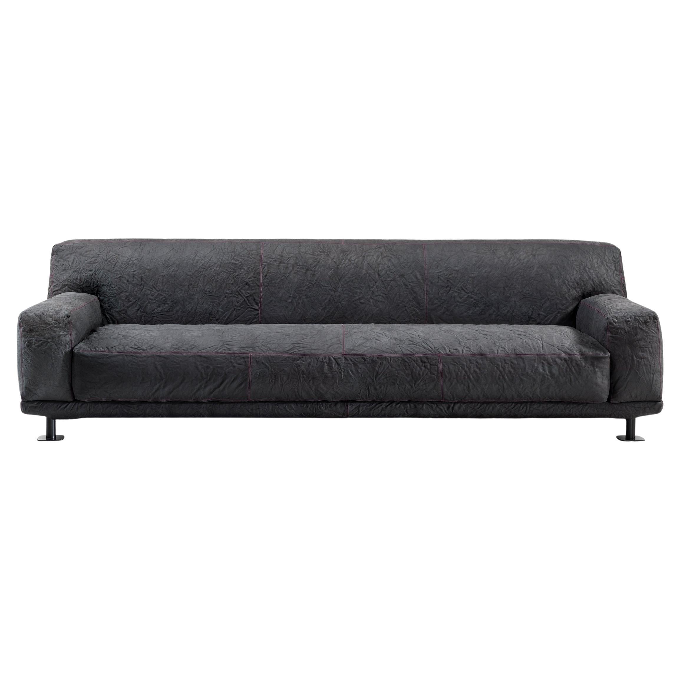 https://a.1stdibscdn.com/newcastle-262-leather-sofa-slate-magenta-by-giulio-iacchetti-for-sale/56838172/f_445318721744725634980/f_44531872_1744725635506_bg_processed.jpg