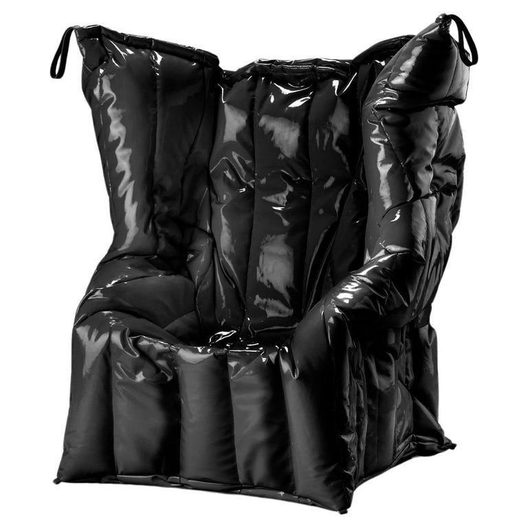 https://a.1stdibscdn.com/shadow-black-armchair-padded-with-soft-polyurethane-foam-by-gaetano-pesce-for-sale/56838172/f_445321121744726719789/f_44532112_1744726720007_bg_processed.jpg?width=768