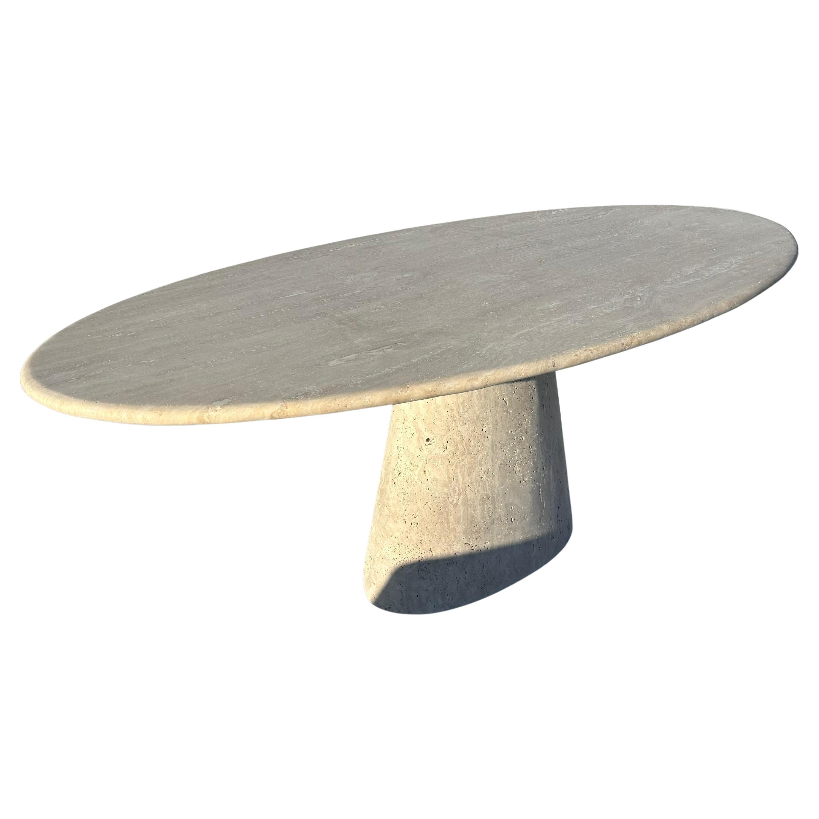 https://a.1stdibscdn.com/modern-ellips-italian-travertine-dining-table-natural-marble-kitchen-table-for-sale/f_91932/f_453973721749559268615/f_44911002_1746617351596_bg_processed.jpg