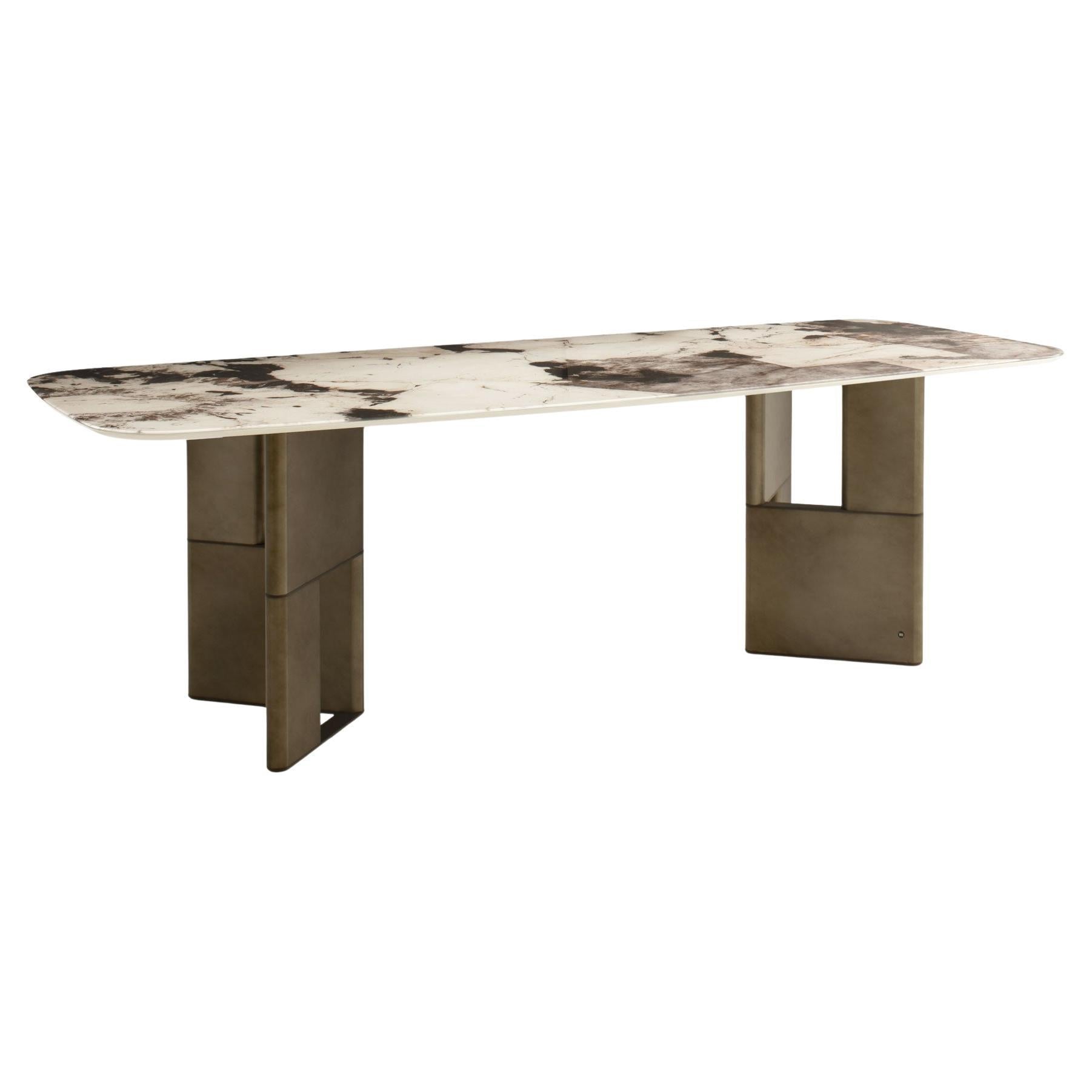 https://a.1stdibscdn.com/tetris-patagonia-glass-and-bronze-dining-table-10-seats-by-morica-design-for-sale/f_12192/f_449165421746639456071/f_44916542_1746639456564_bg_processed.jpg