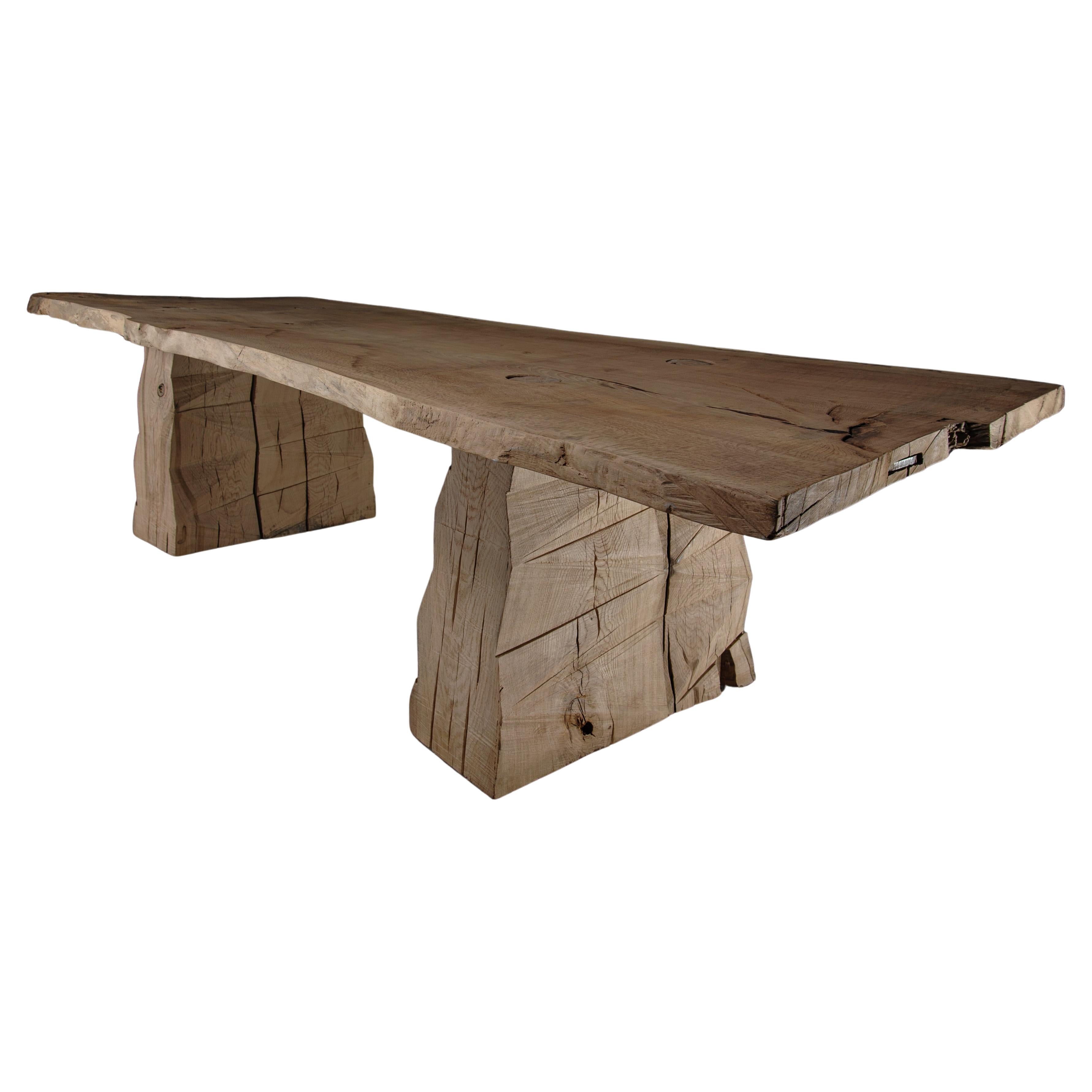 https://a.1stdibscdn.com/customizable-sculpted-massive-dining-table-in-solid-oak-wood-v8-for-sale/f_31233/f_449422721746799651605/f_44942272_1746799652934_bg_processed.jpg
