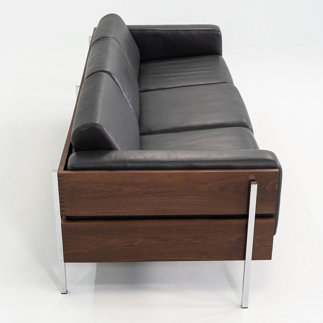 https://a.1stdibscdn.com/2024-robin-day-for-case-three-seat-forum-sofa-in-walnut-and-black-leather-for-sale-picture-4/56838182/f_449683521747135339767/f_44968352_3_master.jpg