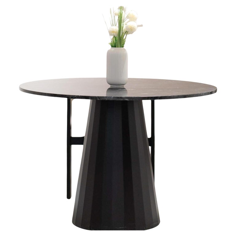 https://a.1stdibscdn.com/alexander-black-marble-dining-table-marble-top-wood-base-for-sale/f_91932/f_450164821747211734748/f_45016482_1747211736130_bg_processed.jpg?width=768