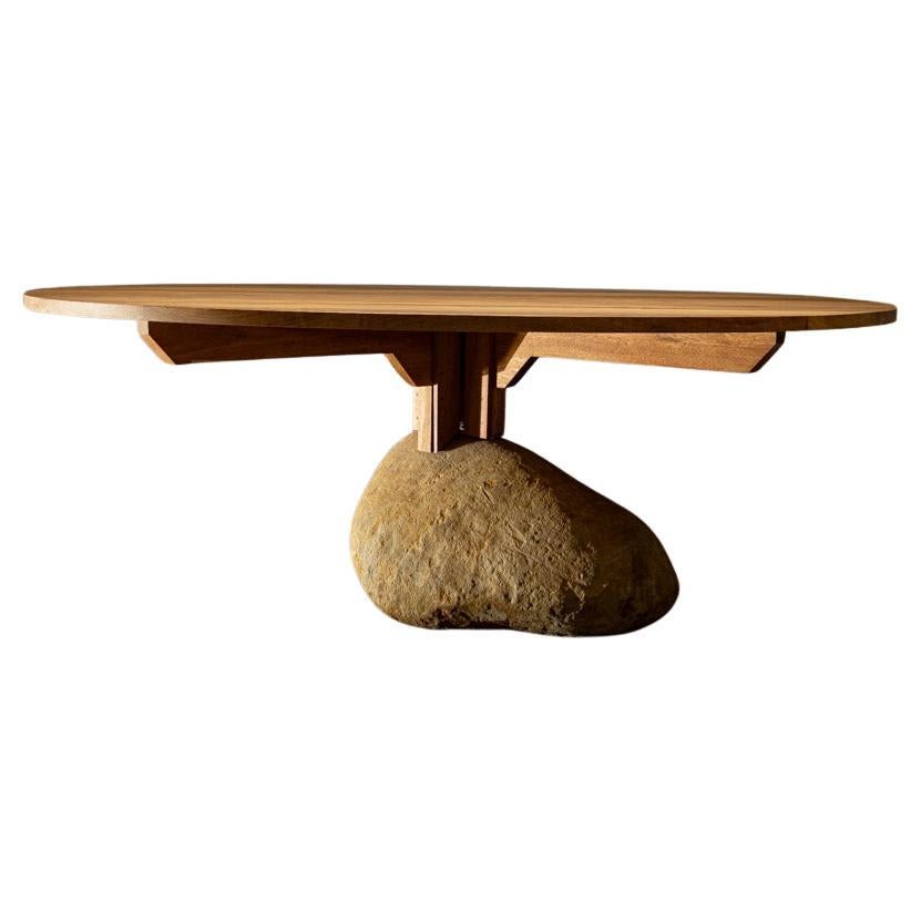 https://a.1stdibscdn.com/round-dining-table-in-catuaba-wood-and-river-stone-by-rodrigo-silveira-brazil-for-sale/f_31733/f_450222621747231923104/f_45022262_1747231923273_bg_processed.jpg