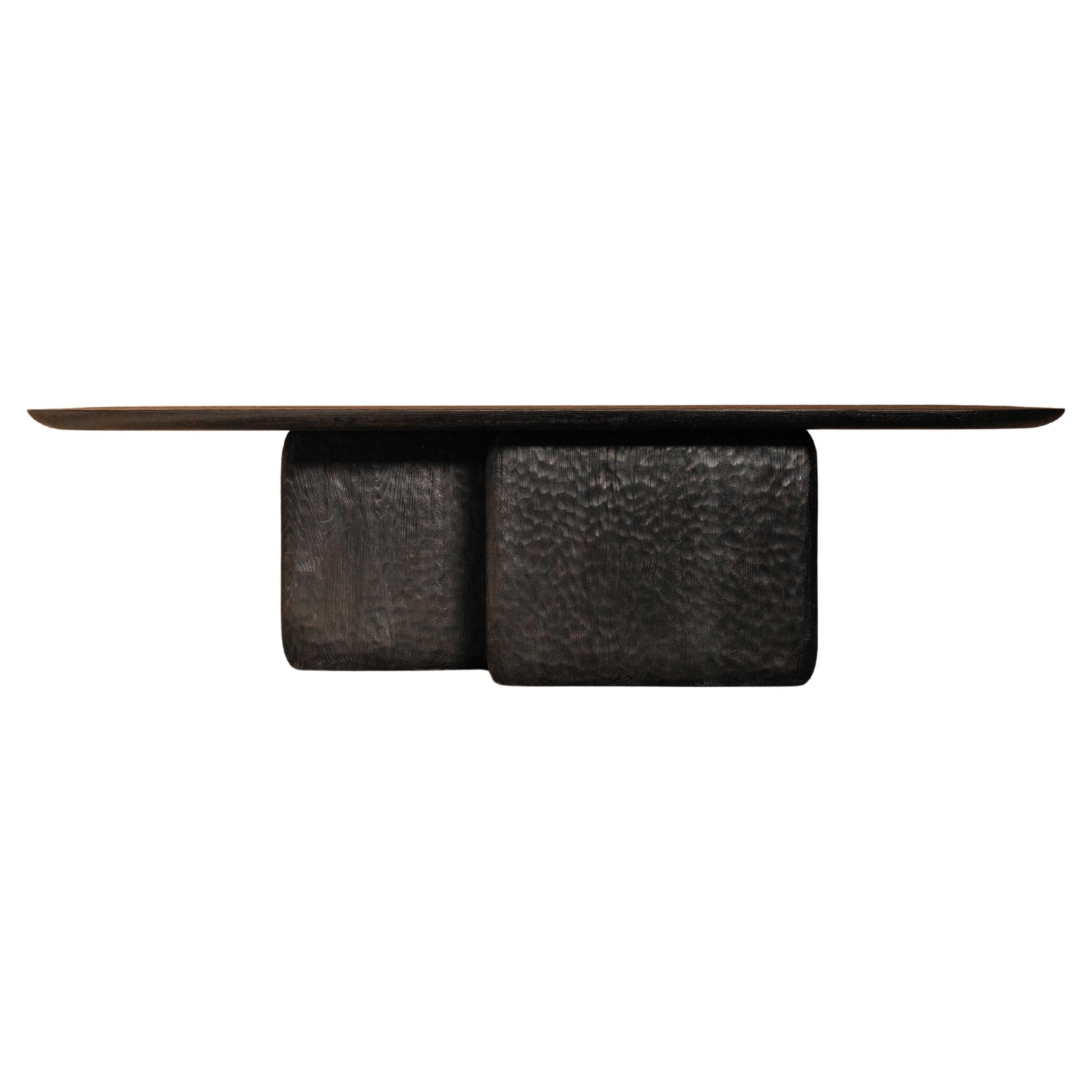 https://a.1stdibscdn.com/handmade-burnt-european-oak-contemporary-darling-dining-table-by-dennis-kaiser-for-sale/f_12192/f_450254321747242807219/f_45025432_1747242808042_bg_processed.jpg