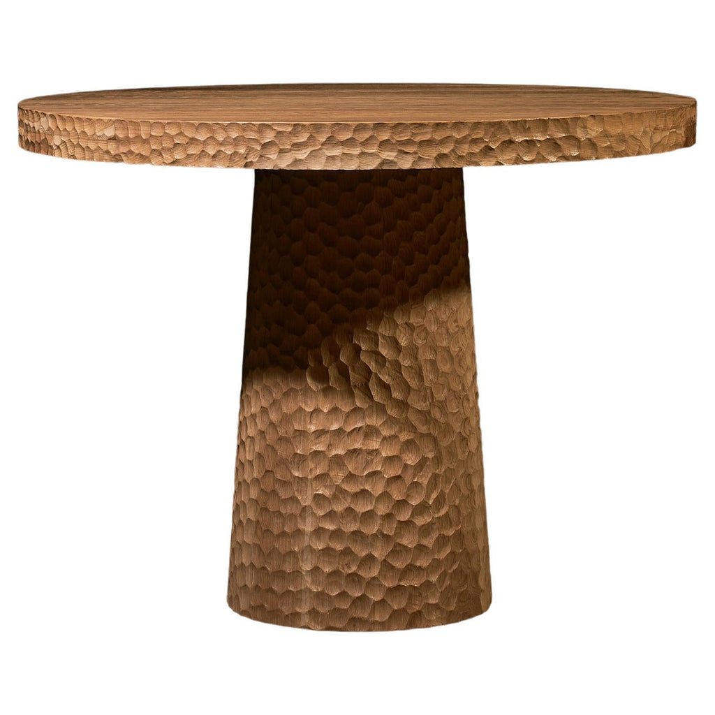 https://a.1stdibscdn.com/round-solid-oak-dining-table-with-hand-carved-texture-and-cone-base-be-vulpe-for-sale/f_99712/f_451751321769425220345/f_45175132_1769425220833_bg_processed.jpg