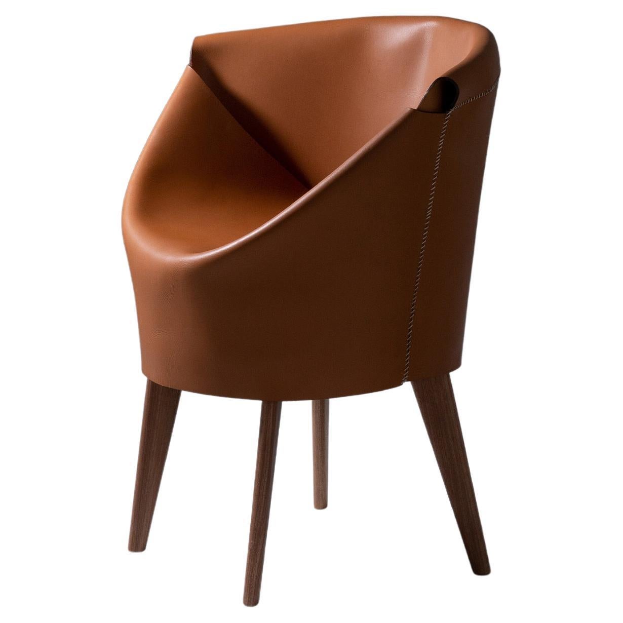 https://a.1stdibscdn.com/ilse-lang-molded-leather-dining-chair-sculptural-comfort-timeless-craft-for-sale/f_104502/f_451864721748261261755/f_45186472_1748261262062_bg_processed.jpg