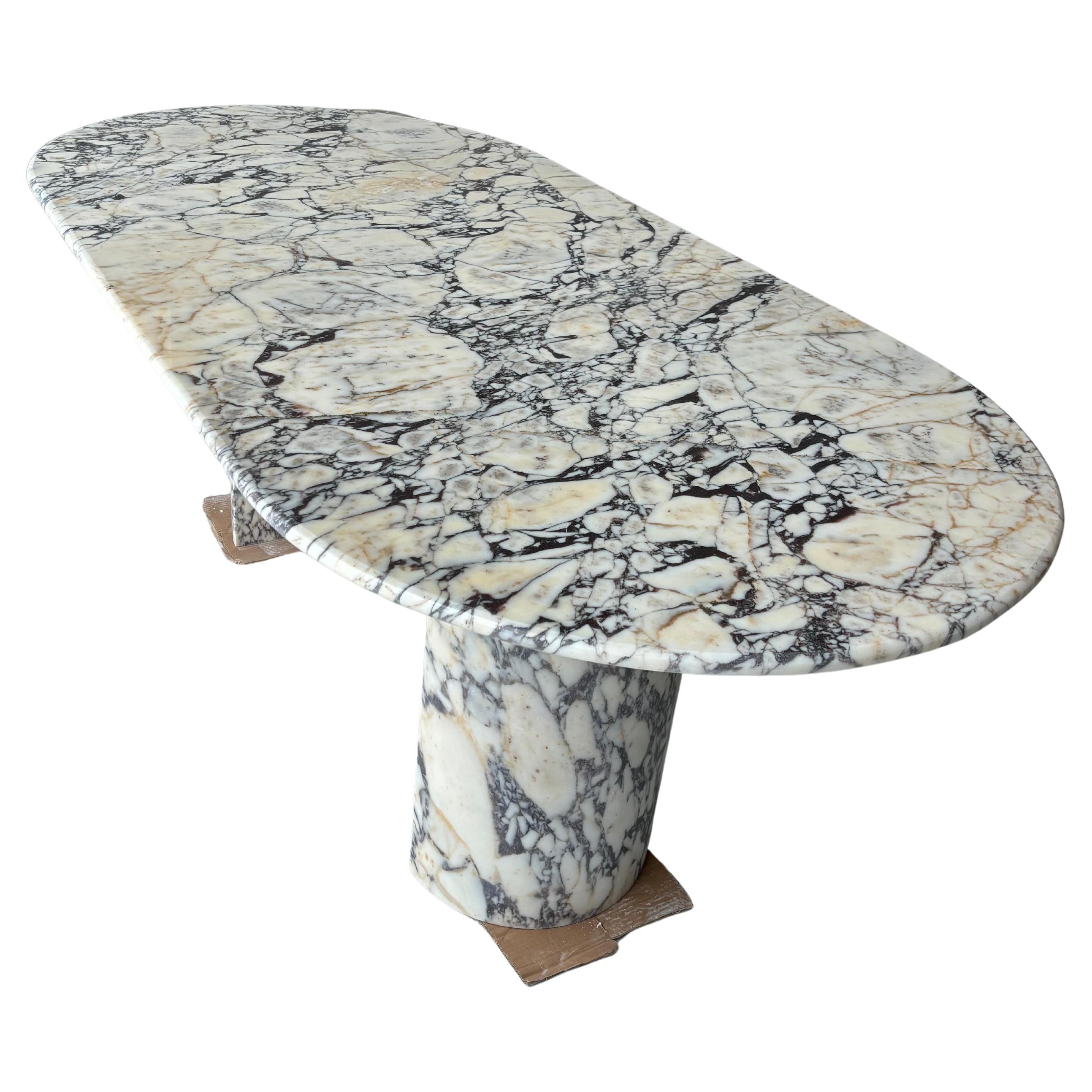 https://a.1stdibscdn.com/modern-oval-calacatta-viola-dining-table-handmade-natural-stone-kitchen-table-for-sale/f_91932/f_451999121748351984228/f_45199912_1748351985457_bg_processed.jpg