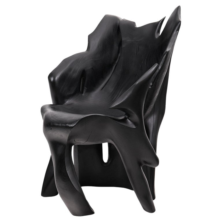 https://a.1stdibscdn.com/sculptural-black-charred-wood-armchair-in-organic-form-by-logniture-for-sale/f_80402/f_452624321748697079875/f_45262432_1748697080523_bg_processed.jpg?width=768