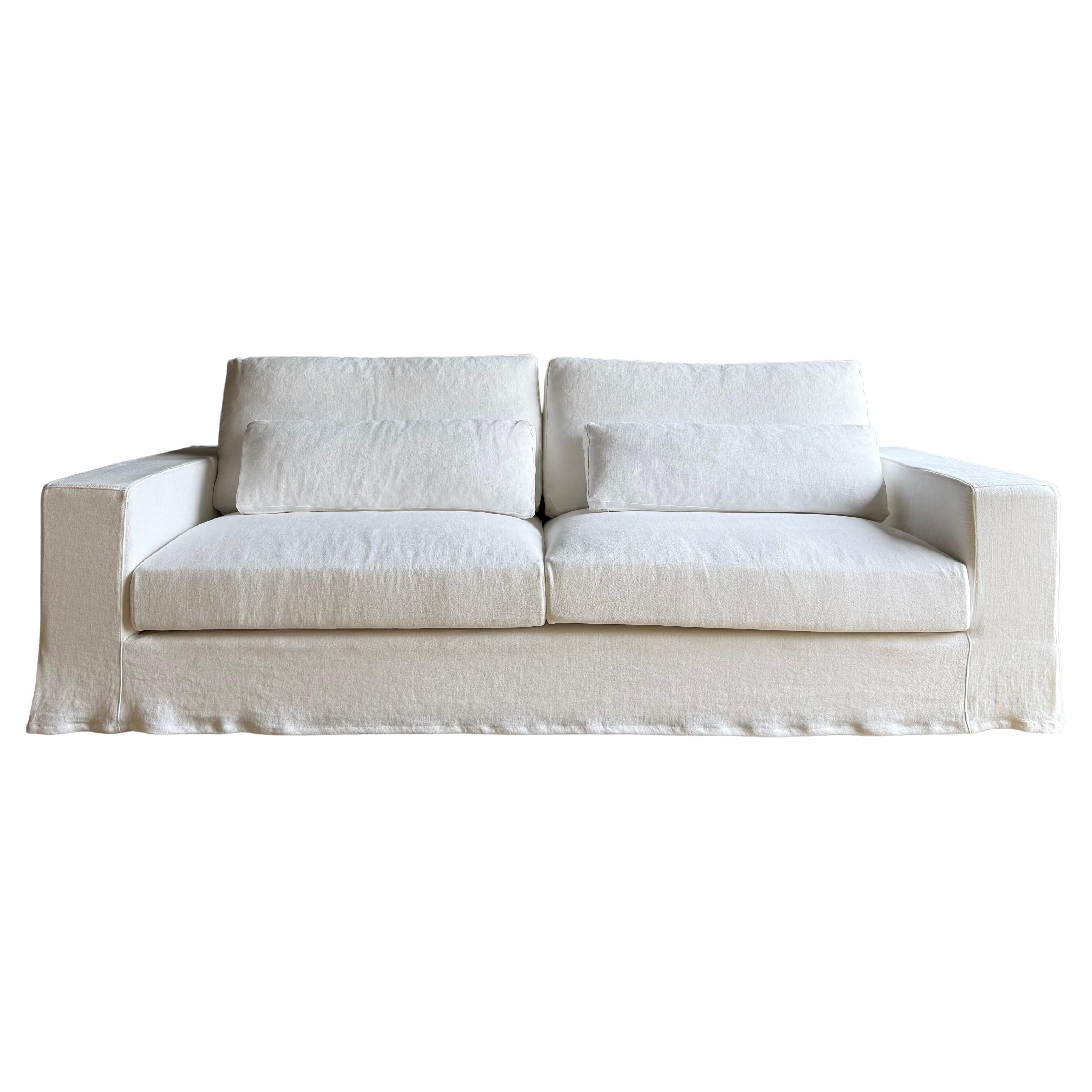 https://a.1stdibscdn.com/custom-made-white-belgian-linen-slip-cover-sofa-with-down-cushions-95-for-sale/f_18223/f_453498521749243718142/f_45349852_1749243719306_bg_processed.jpg